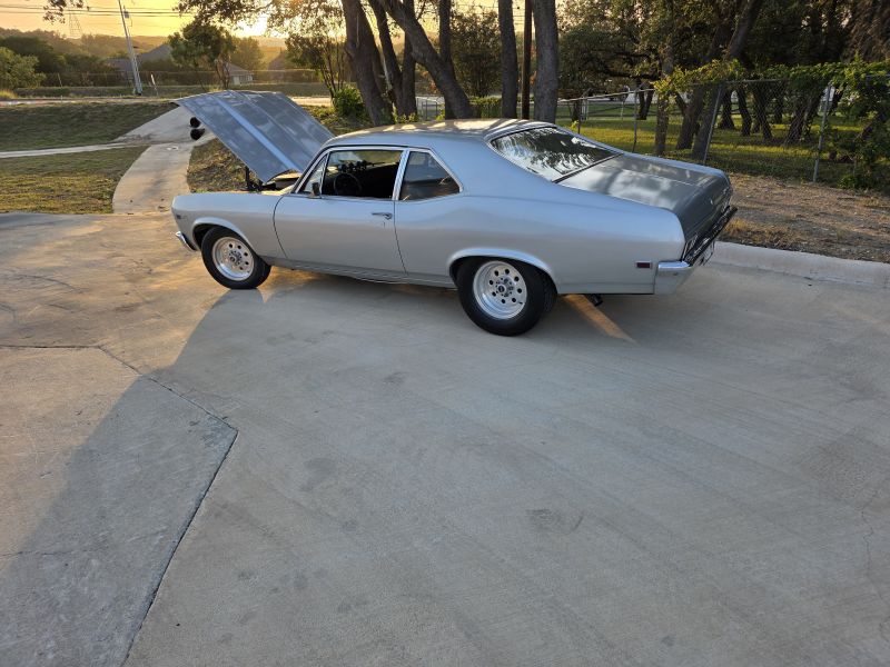 1968 nova sitting in storage facility with beautiful sunset had to take picture!